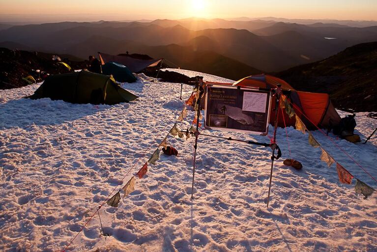 The volunteer team spends a week camped at 6,400 feet on at outcrop of rock at the Sandy Glacier terminus. They’ve named it ‘Kamp Tenacious.’ 