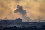 This picture taken from a position in southern Israel near the border with the Gaza Strip shows smoke billowing in the the Palestinian territory after an Israeli strike on November 21, 2023, amid ongoing battles between Israel and the Palestinian Hamas movement.