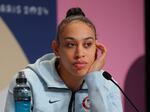 Dearica Hamby speaks during a Team USA 3x3 Basketball press conference in Paris in July. The U.S. women's 3x3 basketball team won bronze at the Olympics last week. 