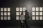 Museum-goers admire the preserved minerals at the "Exquisite Creatures" exhibit.