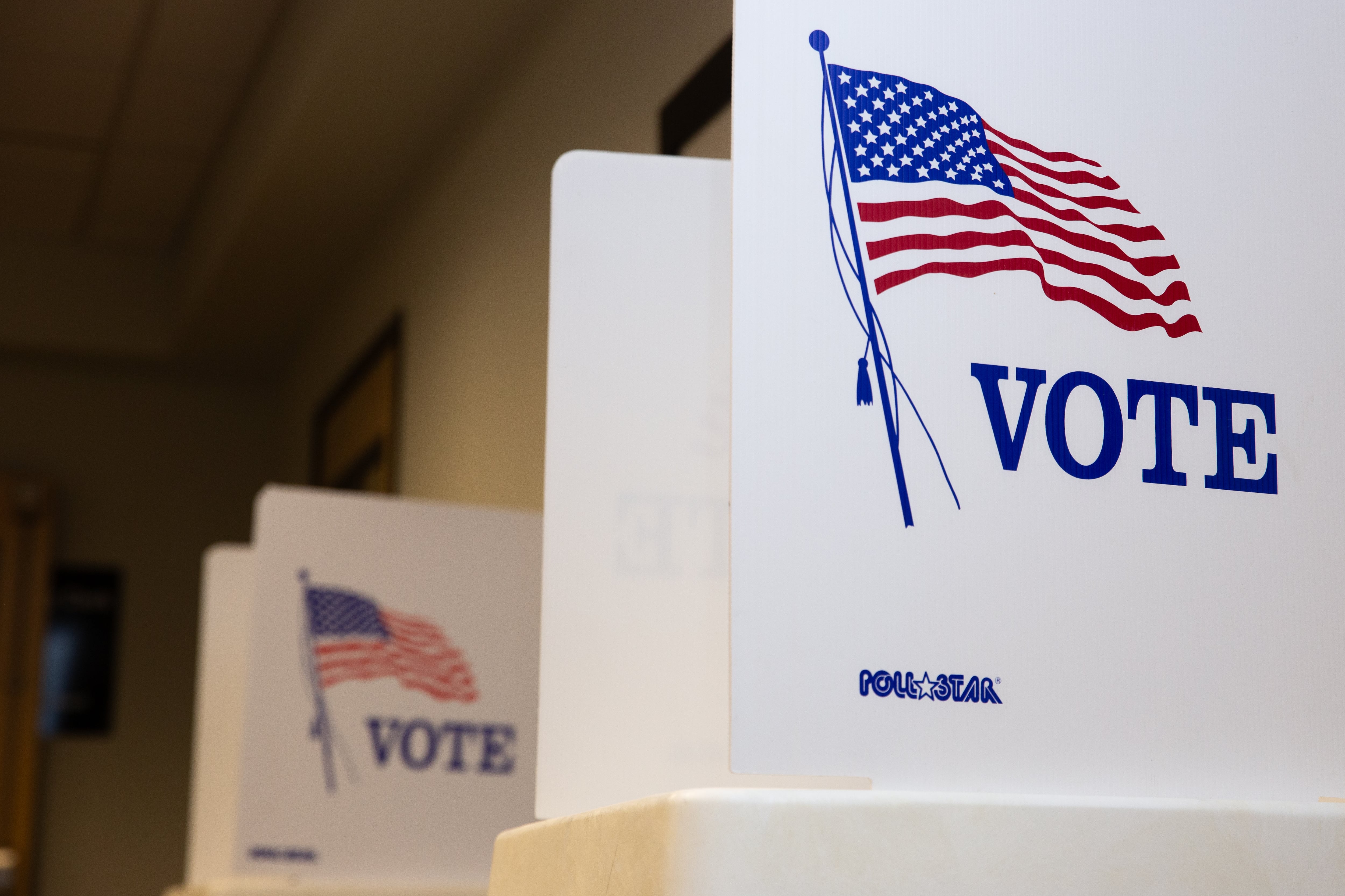 Voting booths sit ready for voters to use in the Deschutes county office in Bend, Ore., on Oct. 14, 2024.