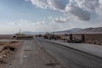 Armor vehicles abandoned by Syrian National Army on their runaway from the frontlines on the M2 highway heading from Damascus to the Iraqi border in Syria, Friday 13, 2024.