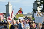 Demonstrators gathered Thursday morning to protest Trump's proposed arch, which would stand in a traffic circle on the bridge connecting the National Mall to Arlington National Cemetery.