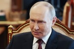 Russian President Vladimir Putin speaks with Russian Chief of General Staff Gen. Valery Gerasimov during their meeting at the Kremlin in Moscow on Saturday.