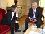 Ofer Bronchtein sits down with Palestinian Authority President Mahmoud Abbas in Paris, April 21, 2011. Abbas followed through on a promise made by his predecessor, the late leader Yasser Arafat, to give Bronchtein a Palestinian passport as a symbolic gesture for his peace efforts.