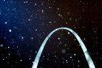 Snow falls on the Gateway Arch National Park during the waning hours of Saturday, Jan. 4, 2025, in downtown St. Louis. Snow and ice are expected to pummel the Midwest — and notably Missouri — as Winter Storm Blair makes its way across the country.