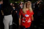 MONROEVILLE, PA-September 28: An attendee to the Courage Tour waits in line for entry into the Monroeville Convention Center on September 28, 2024 in Monroeville, Pennsylvania.(Jeff Swensen for NPR)