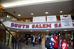 Students walk the halls of South Salem High School in Salem, Ore., Tuesday, Sept. 17, 2019.