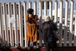 Asylum seekers wait for news on the CBP One appointments at El Chaparral crossing port in Tijuana, Baja California state, Mexico, on January 21, 2025.