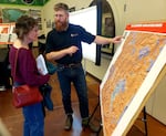 OSU researcher Andy McEvoy explains the new hazard categories to an Oregon property owner.