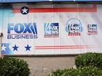 The logos for Fox programs are displayed on the News Corp. building on Jan. 25, 2023 in New York City.