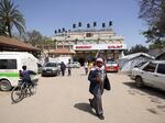 People walk outside the European hospital in Khan Younis, in the southern Gaza Strip, on May 17, amid the ongoing conflict in the Palestinian territory between Israel and the militant group Hamas. 
