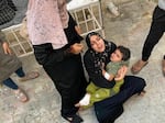 At Mohammed Yousef al-Najjar Hospital in Rafah, Palestinians mourned children and relatives from four different families killed in Rafah as Israel resumed its bombing campaign Friday morning in the Gaza Strip.