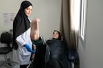 Raneem Hijazi was injured when the apartment in Gaza where she was sheltering was bombed. She's working on building strength in her legs, though she will still need more surgeries before she can heal.