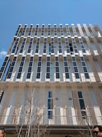 A building in the Japanese "smart city" of Kashiwanoha features vertical solar panels.