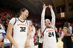 Oregon State center Sela Heide (32) and guard Adlee Blacklock (24) react following their win over Eastern Washington in a first-round college basketball game in the women's NCAA Tournament in Corvallis, Ore., on Friday, March 22, 2024.