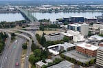 Traffic moves along I-5 next to downtown Vancouver on Monday.