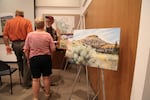 The staff at the John Day Fossil Beds revealed the winners of an art contest that featured photography and paintings of the area. Patricia Baehr-Ross, whose pieces are pictured, won the grand prize of $500.