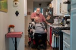 Maureen and Joe Perry pose for a portrait in the kitchen of their high efficiency manufactured home at Two Rivers Homeowners Cooperative in Gladstone, Ore., on Jan. 8, 2026.