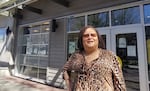 Julia Mines stands outside the Miracles Club of Portland, where she serves as executive director, on Northeast Martin Luther King Jr. Boulevard on April 7. She said if funds don't come through soon, she may have to lay off staff.
