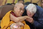 Actor Richard Gere, right, kisses the hand of Tibetan spiritual leader the Dalai Lama at an event celebrating the Dalai Lama's 90th birthday in Dharamshala, India, Sunday.
