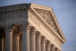 In this Nov. 5, 2020, file photo the Supreme Court is seen in Washington. The Supreme Court on Wednesday, Dec. 2, struggled with whether to require new trials for potentially thousands of prisoners in Louisiana and Oregon who were convicted by non-unanimous juries before the court barred the practice last year. 