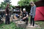 The Stephens attempt to build a fire in the backyard of their north Portland home.