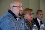 Josh Shorthill, left, talks to reporters while Sue Zawacky, right, looks on. The family annouced June 24 they intend to sue Clark County over Jenoah Donald's death.
