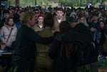 The family of Israeli soldier Ilay Levy mourns during his funeral at the military cemetery in Tel Aviv on Jan. 23, after he was killed in combat in Gaza during an incident that claimed the lives of nearly two dozen Israeli soldiers.