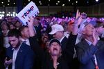 Supporters watch returns at a campaign election night watch party for Republican presidential nominee former President Donald Trump at the Palm Beach Convention Center, Wednesday, Nov. 6, 2024, in West Palm Beach, Fla.