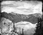 This photograph, taken by Peter Britt in 1874, is the first known successful photograph ever taken of Crater Lake.