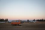 The sun sets over the Oregon Eclipse Festival campgrounds.