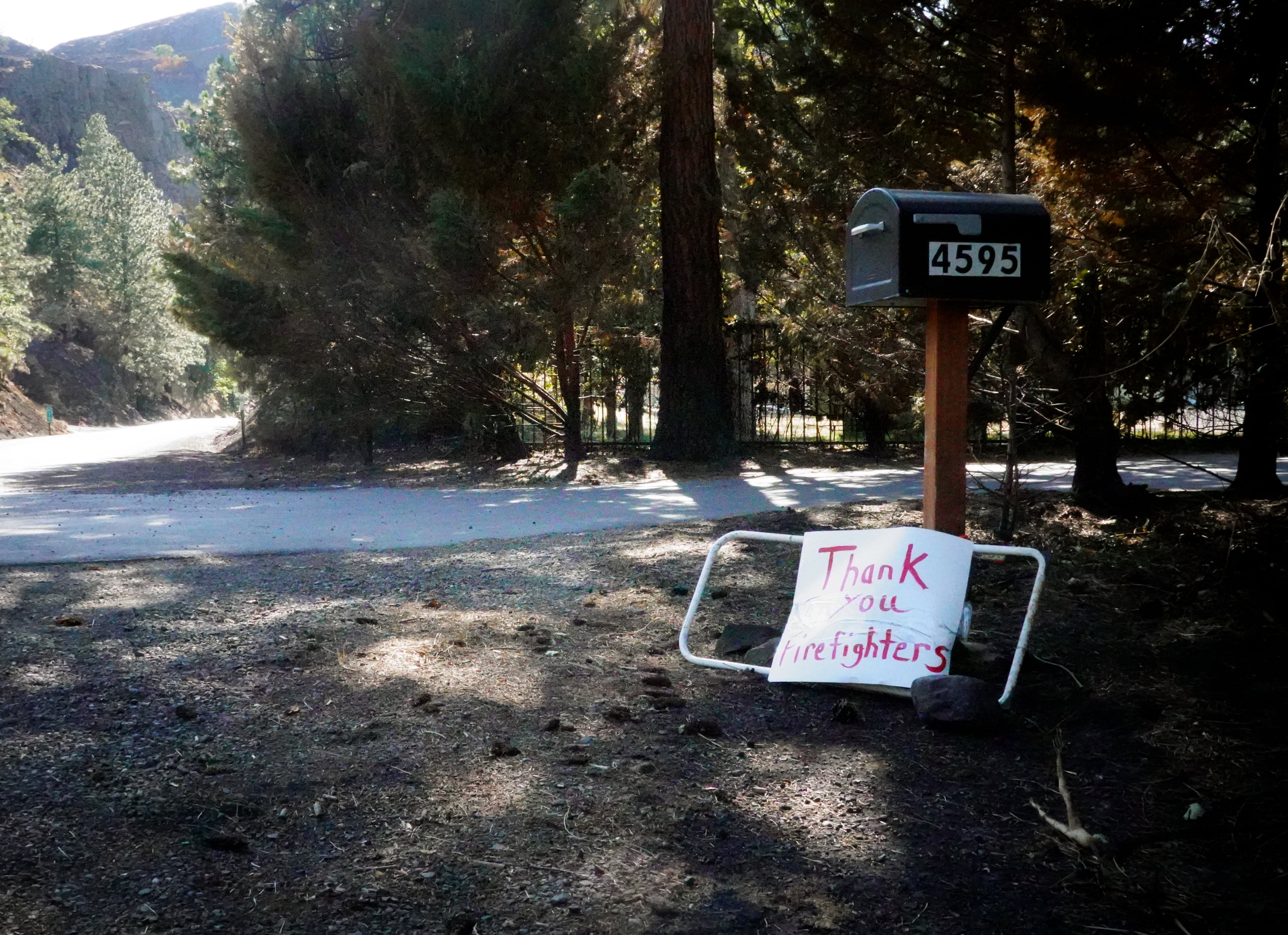 A sign outside a home near The Dalles, Ore., thanks firefighters for helping with the Rowena Fire.
