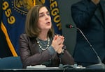 FILE - Then-Oregon Gov. Kate Brown speaks on Nov. 10, 2020, in Portland, Ore. Brown has defended granting clemency to dozens of people.