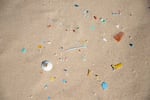 Plastics and micro plastics of different shapes and colors are laid on the fine sand of the Grand Crohot beach in Lege-Cap-Ferret in New Aquitaine in France on April 29 2019.