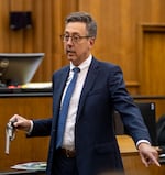 Clark County Prosecutor Tony Golik holds the revolver  used in the shooting death of Clark County Sheriff Sgt. Jeremy Brown on Monday, Sept. 25, 2023, during the prosecution’s closing arguments in the murder trial of Guillermo Raya Leon at the Clark County Courthouse. Leon, who has claimed self defense, is accused of fatally shooting Brown in July 2021.