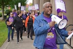 In this provided image from SEIU, Local 503 President Johnny Earl leads a march on the Oregon State University campus on June 30, 2026.