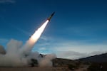 In this image provided by the U.S. Army, soldiers, from the 3rd Battalion, 321st Field Artillery Regiment of the 18th Field Artillery Brigade out of Fort Bragg N.C., conduct live fire testing at White Sands Missile Range, N.M., on Dec. 14, 2021, of early versions of the Army Tactical Missile System.