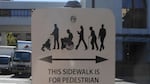 Pedestrians only street sign.
