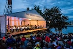 Members of the Oregon Symphony perform for a large crowd at the annual Waterfront Concert and Festival. After a four-year hiatus, the Symphony is bringing the festival back. 