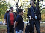 Rob Manning interviews Logan while mother Angelina looks on.