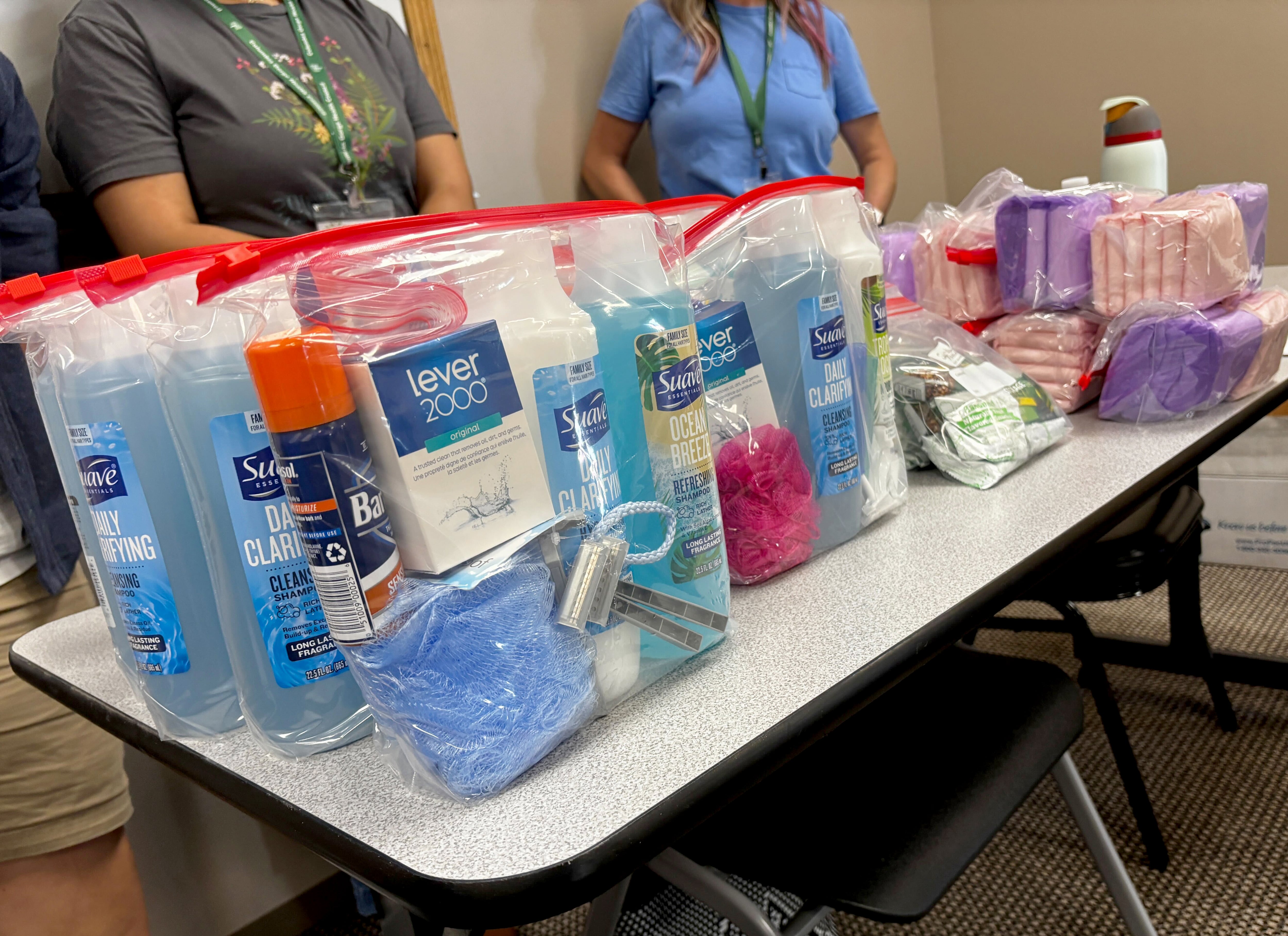 On Wednesday, Bridges to Health, a nonprofit based in The Dalles, offers bags of toiletries at a resource fair for people affected by the Rowena Fire.