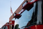 The American flag at Portland Fire & Rescue Station 1 flies at half-staff commemorating the terrorist attacks of Sept. 11, 2001.