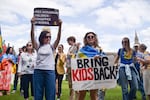 Protesters hold placards during a demonstration in Parliament Square in London, demanding the release of Ukrainian children kidnapped by Russia and an end to Russian aggression in Ukraine. The Ukrainian government has insisted that the return of children from Russia be part of any peace deal with the country.
