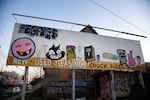 A billboard taken over by street art in the Buckman neighborhood, Portland, Ore., on Thursday, March 19, 2020.