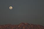 The supermoon rises over the Andes in Santiago, Chile on Tuesday.