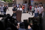 Ismail al-Thawabta, general director of the Hamas-run government media office, center right, speaks during a press conference at Al-Aqsa Hospital in Deir al-Balah, central Gaza Strip, Monday, July 6, 2026.