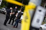 Police Chief Chuck Lovell, right, was among those responding to a person believed to be armed inside a vacant home in the Sellwood neighborhood of Portland, Ore., Sunday, June 28, 2020. One officer fired their weapon and the subject was not injured.