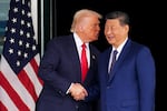 U.S. President Donald Trump and Chinese President Xi Jinping shake hands as they depart following a bilateral meeting at Gimhae Air Base on October 30, 2025 in Busan, South Korea.