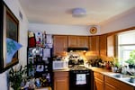 The kitchen in Becca Morris’ public housing apartment, where she’s lived with her son for nine years, is seen in Bridgeville, Delaware on Wednesday, May 14, 2025. (Wesley Lapointe/ for NPR)